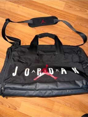 Jordan Black Duffel Bag with Red Jumpman Accent